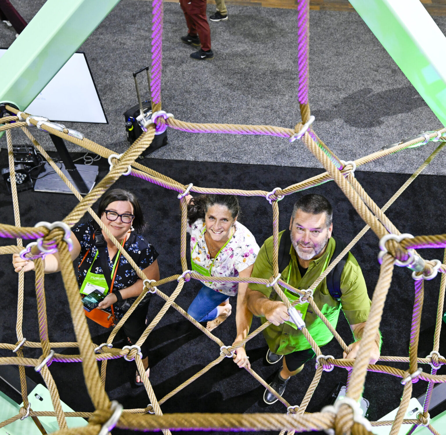 NRPA Conference attendees explore playground equipment in exhibit hall