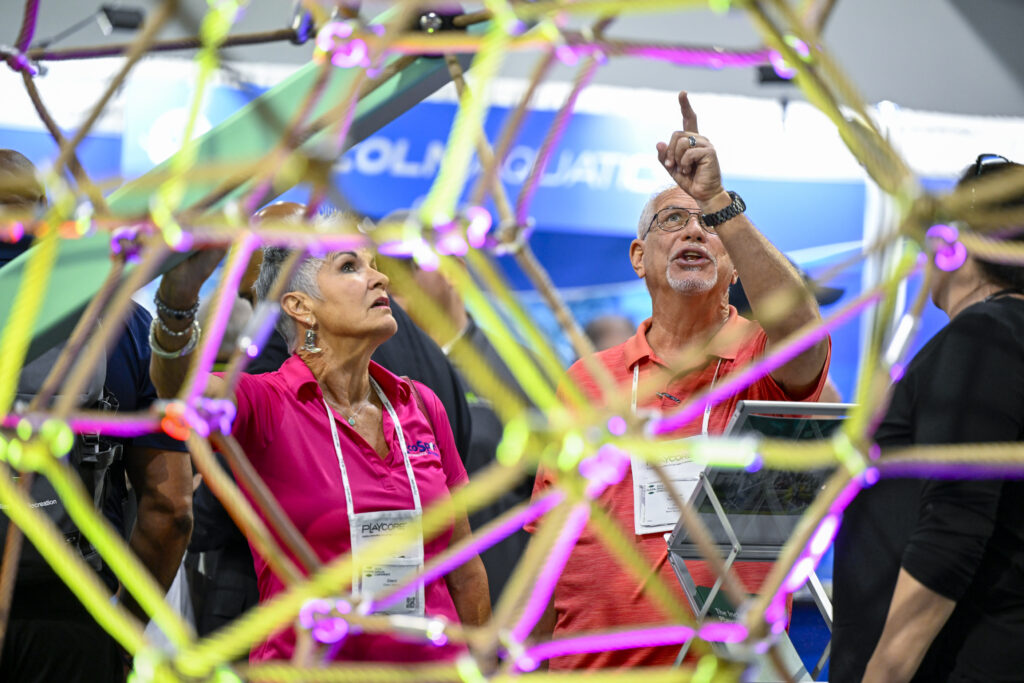 Attendees explore the exhibit hall