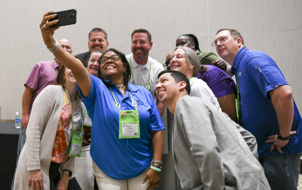 2025 NRPA Annual Conference attendees pose for group selfie