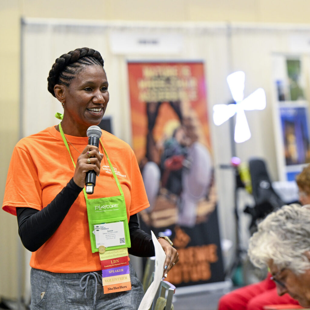 A 2025 NRPA Annual Conference speaker presents to audience of attendees