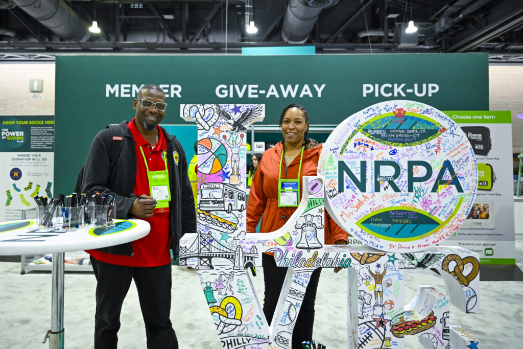 NRPA Annual Conference attendees in the member booth area